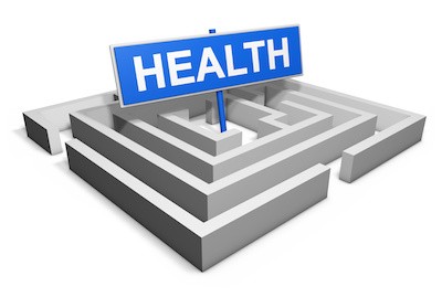 Healthy lifestyle achievement concept with a labyrinth and a blue goal sign with health text isolated on white background.