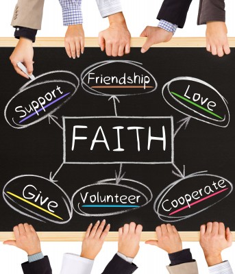 Photo of business hands holding blackboard and writing FAITH diagram